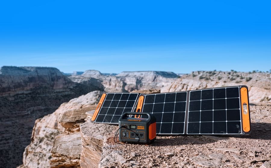 Jackery Solar Generator 1000 with a folding SolarSaga panel set up outdoors.
